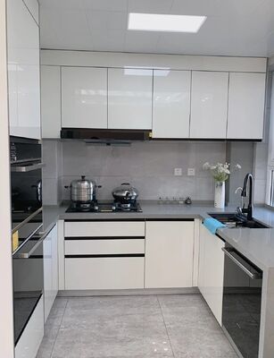 buy Customized Free Design PVC Glossy Kitchen Cabinet For Apartment Villa online manufacturer
