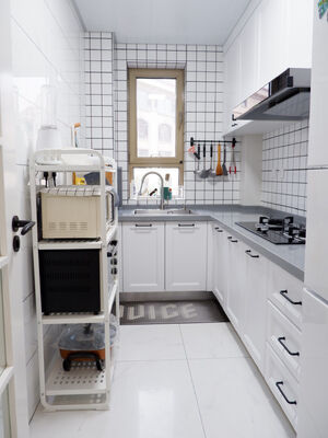 buy Modern Design Melamine Finish With Quartz Stone Waterfall Island Kitchen Cabinet online manufacturer